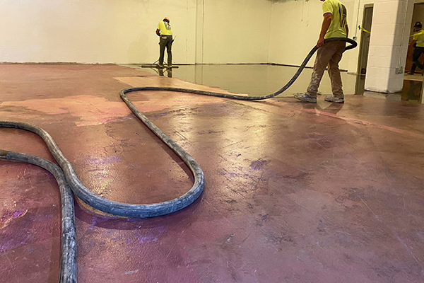 Kent contractors pumping in self-leveling floor products